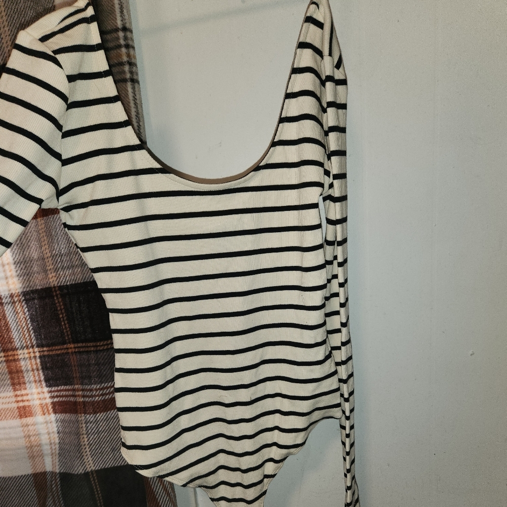 Never worn before Forever 21 body suit.